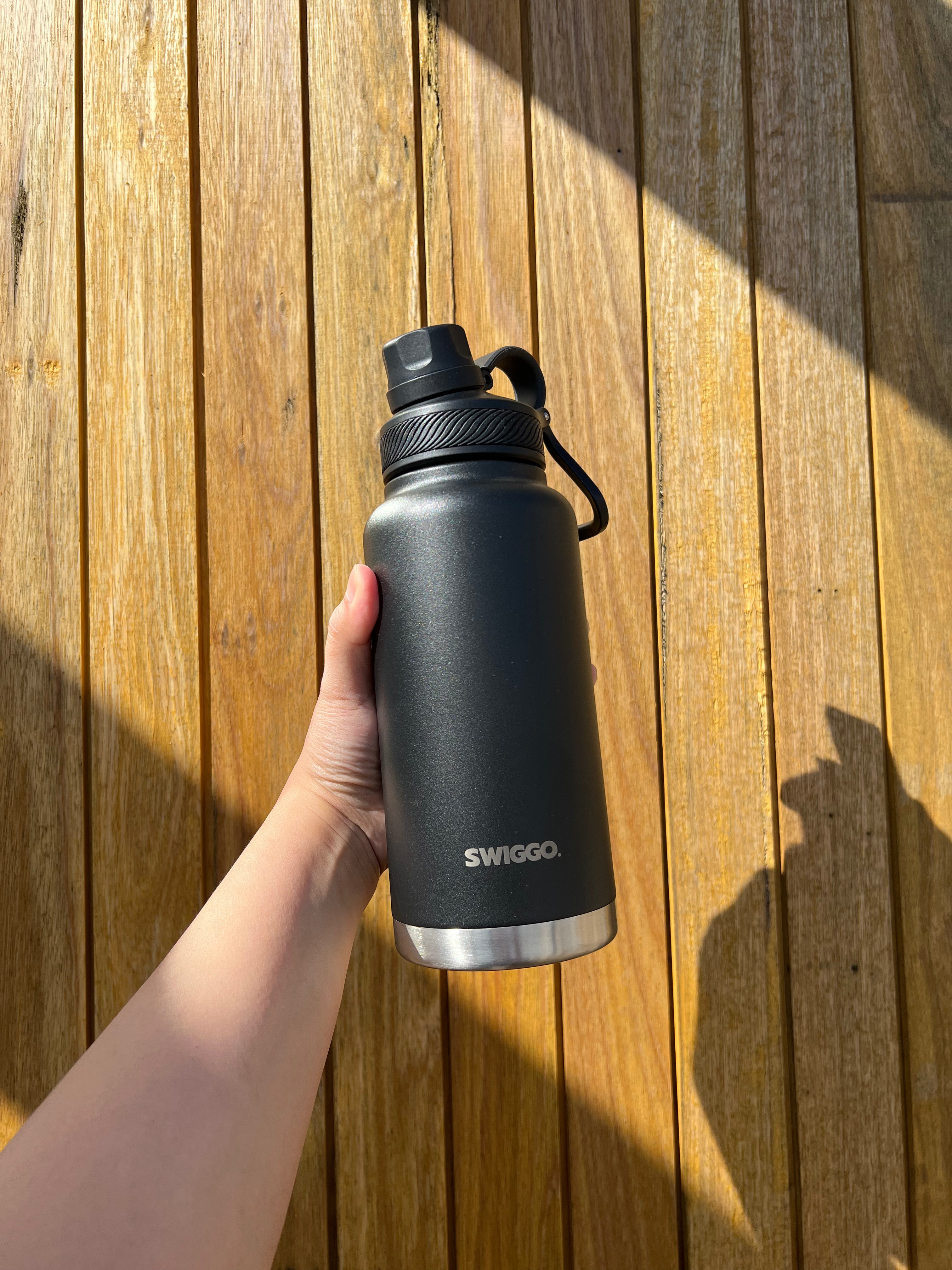 The Guzzlr Vacuum Insulated Water Bottle (with 2 lids)
