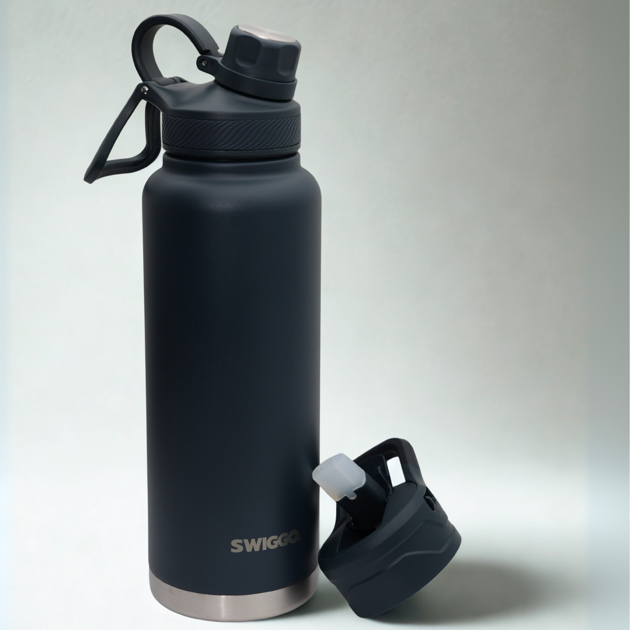 The Guzzlr Vacuum Insulated Water Bottle (with 2 lids)